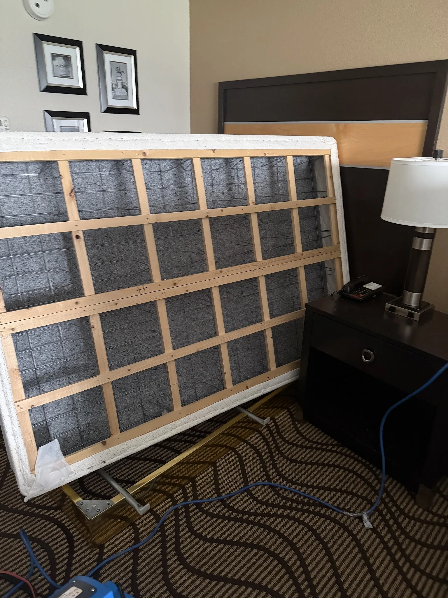 Box spring flipped for bed bug inspection and treatment